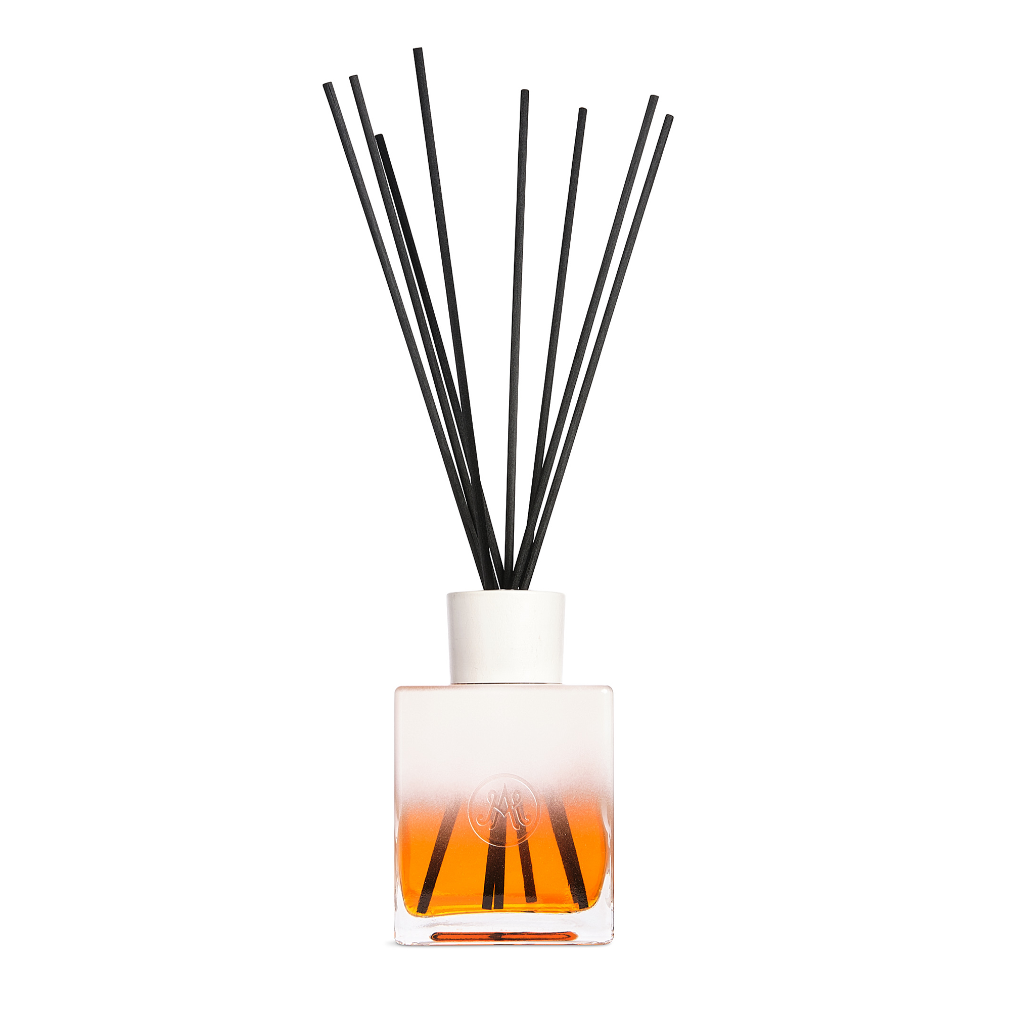 A gradient orange diffuser with a white cap and black reeds, featuring a sleek and modern design. The reeds are spread out from the top, indicating active use for releasing fragrance of lemon zest, tangerine, fresh mint, basil, and a hint of coriander.