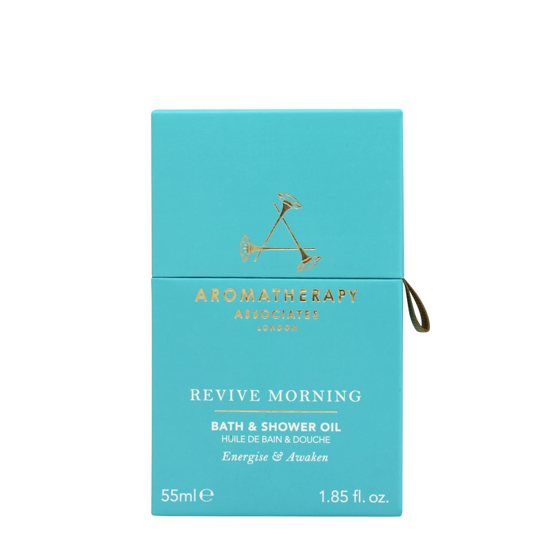 Revive Morning Bath and Shower Oil packed in vibrant turquoise box.