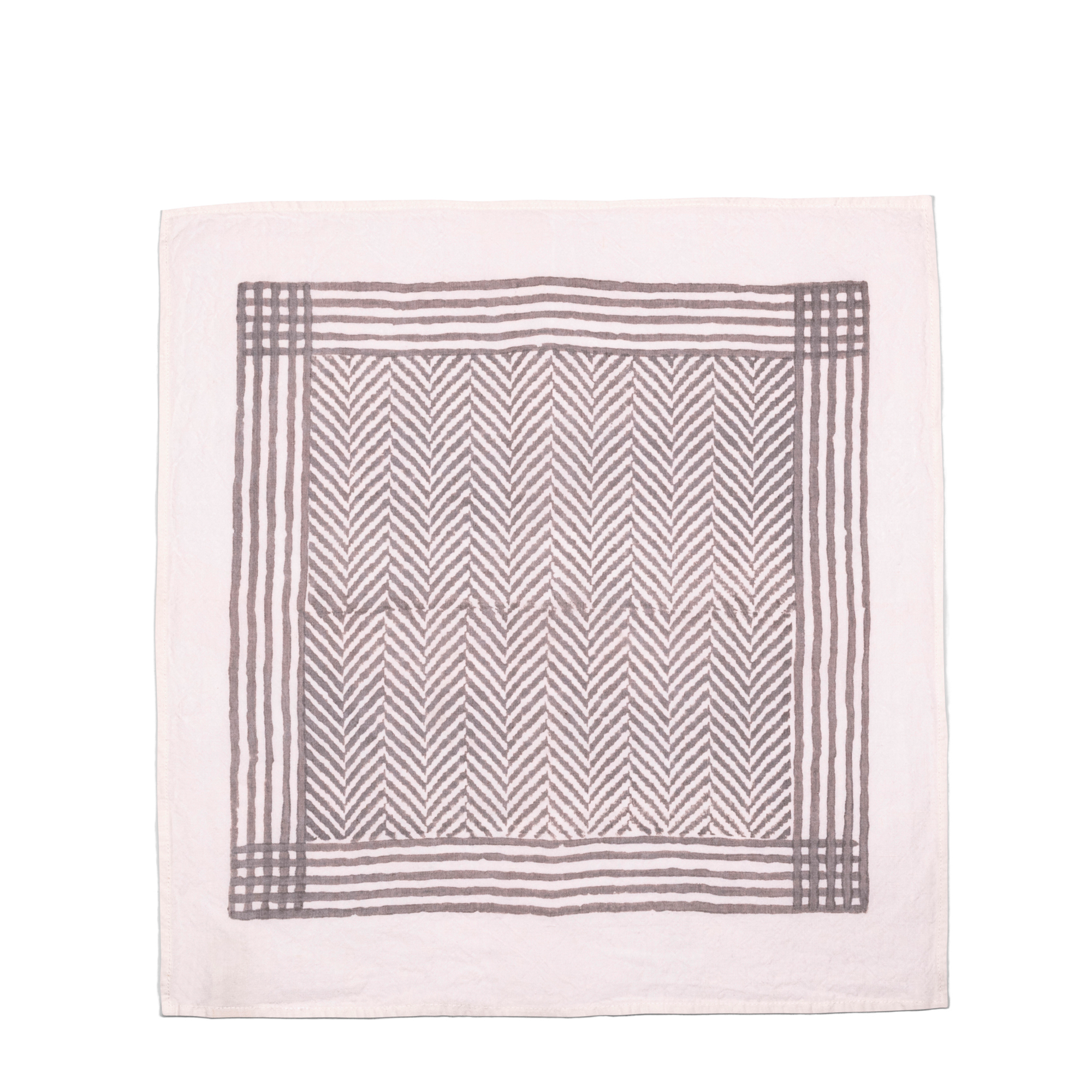 Unfolded napkin with its subtle yet trendy grey chevron pattern on white base brings contemporary charm to your table setup.