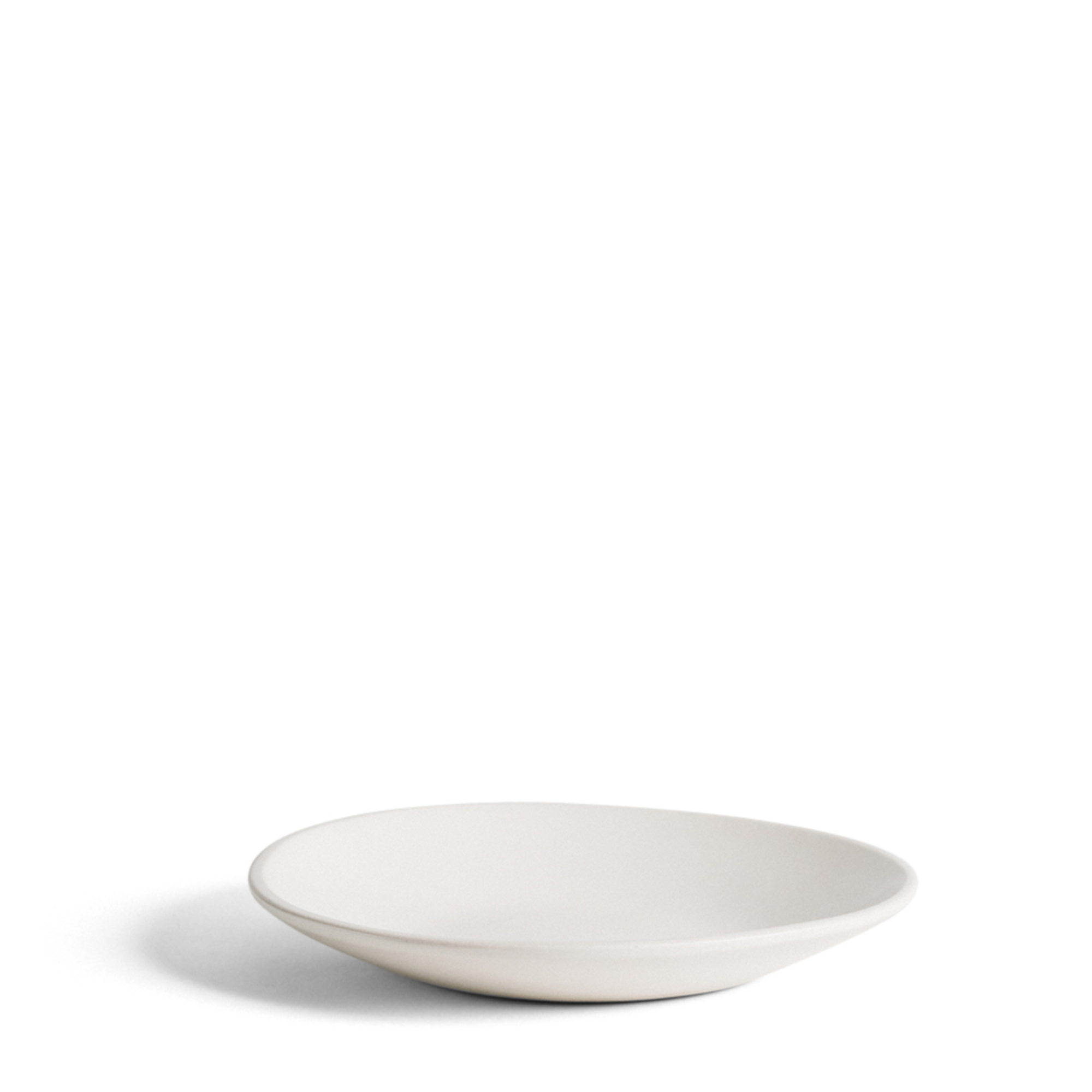 White stoneware dinner plate, Dadasi, designed for a sleek and timeless look. Perfect for elevating your dining experience with its elegant simplicity.