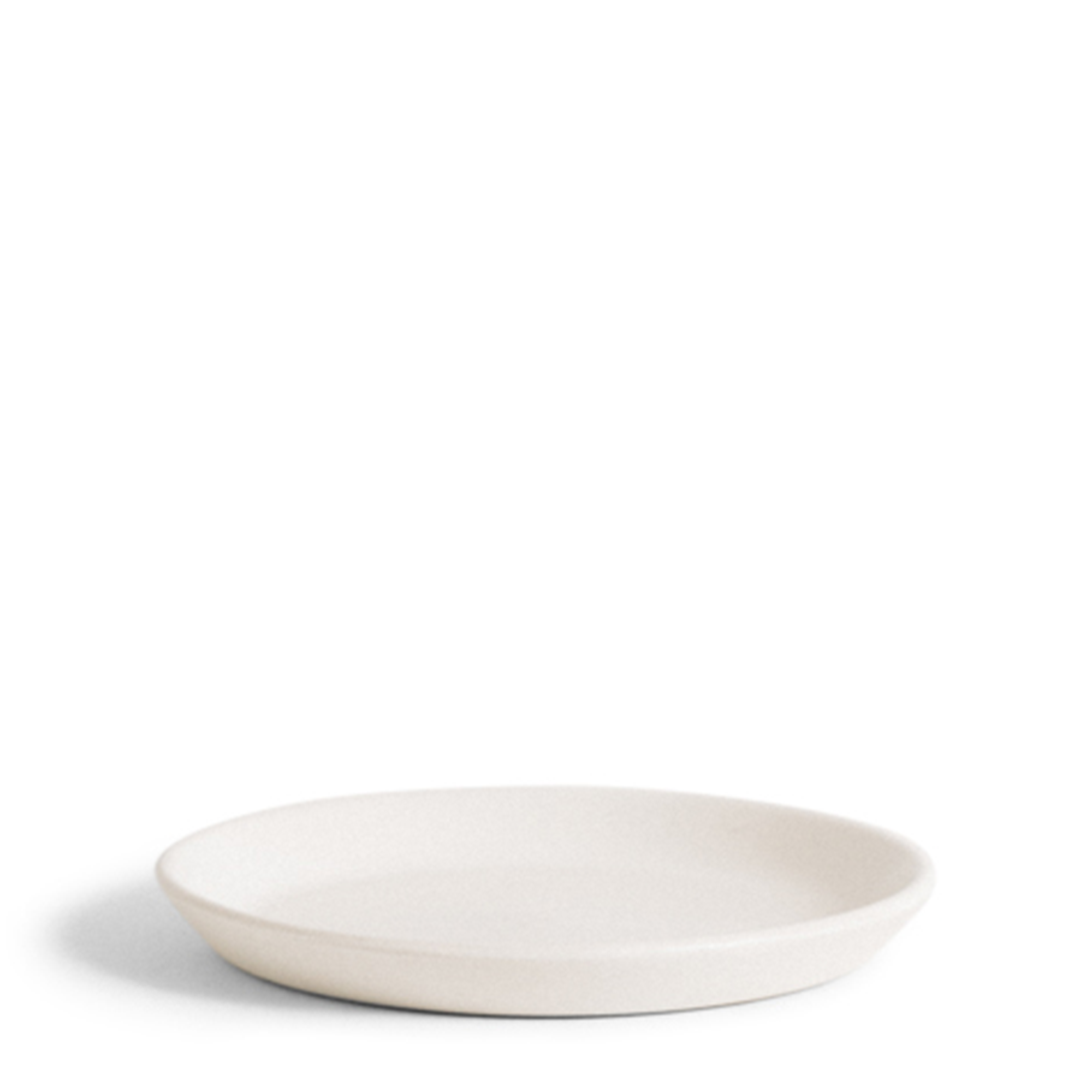White stoneware flat dessert plate, perfect for serving desserts or small treats. Sleek design, ideal for both everyday use and special occasions.