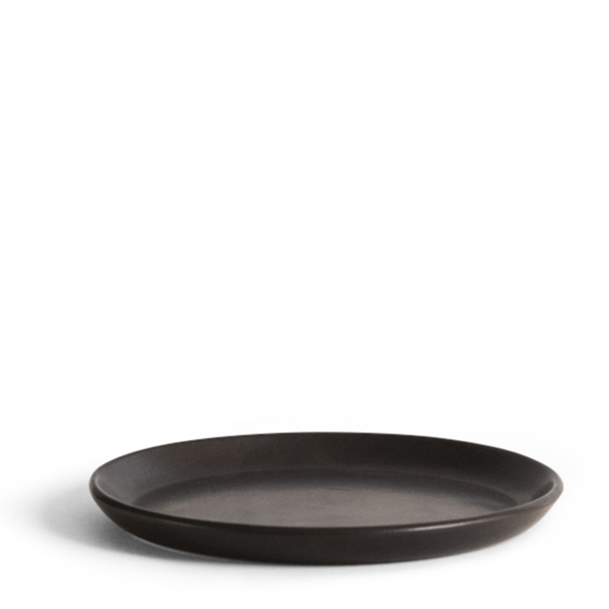 Black stoneware flat side plate, perfect for serving side dishes or small snacks. Sleek design, ideal for both everyday use and special occasions.