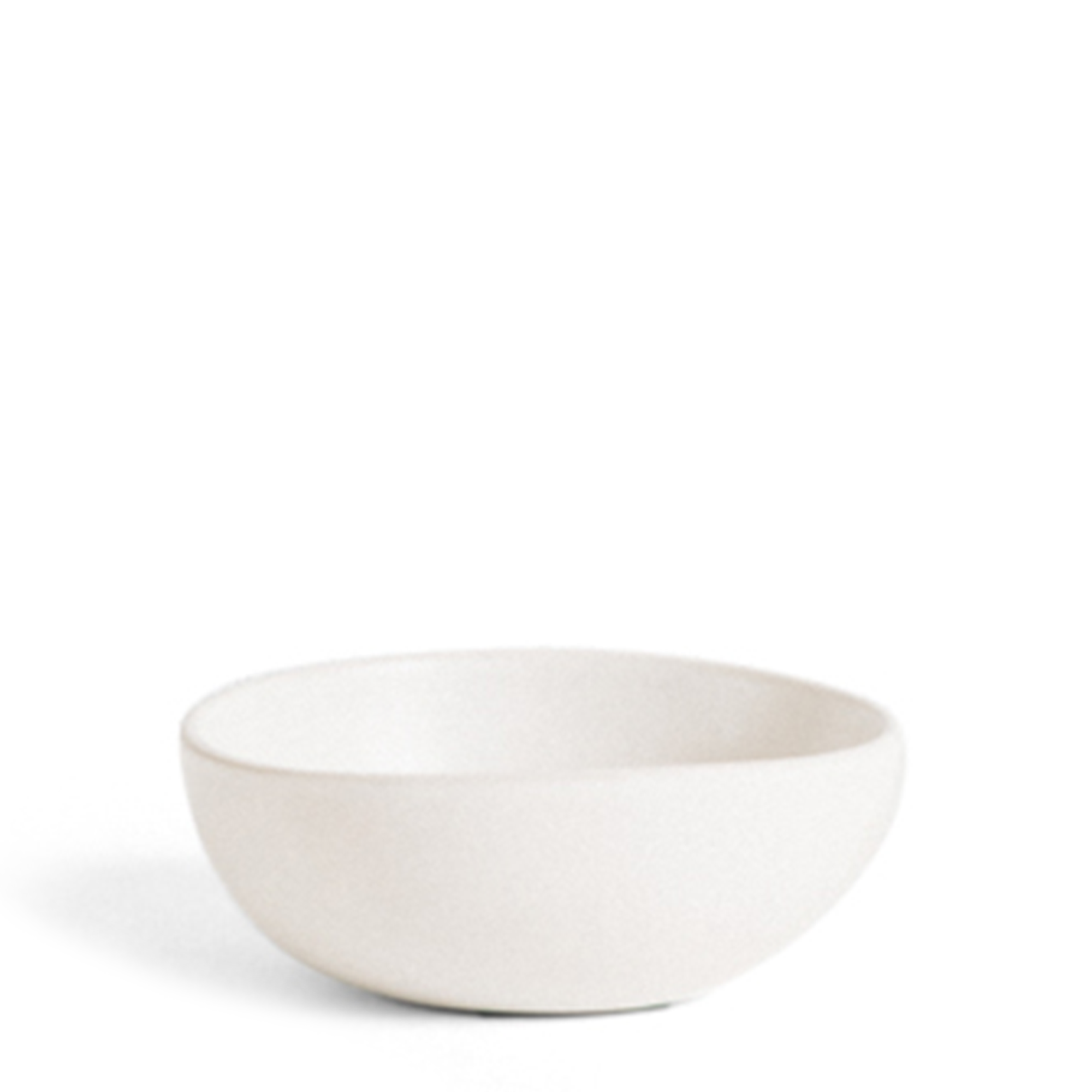 Organically shaped stoneware bowl for serving condiments, dips, or sauces. It keeps salsas and dips cool or melted chocolate warm.