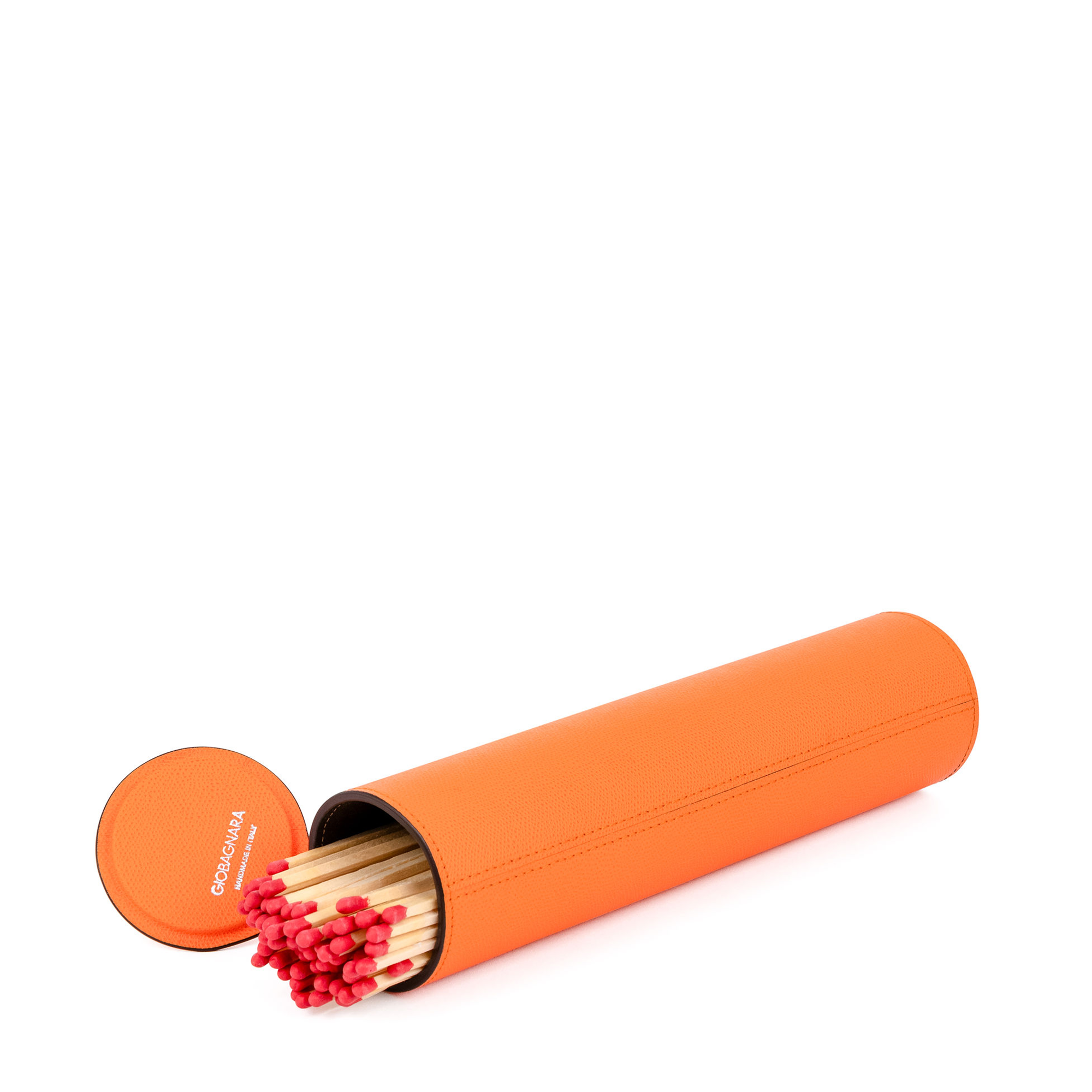 This luxurious set of giant matches in a premium orange calfskin-wrapped holder is the chicest way to light your fires. It includes 60 matches and has a strike pad at the base of the holder.
