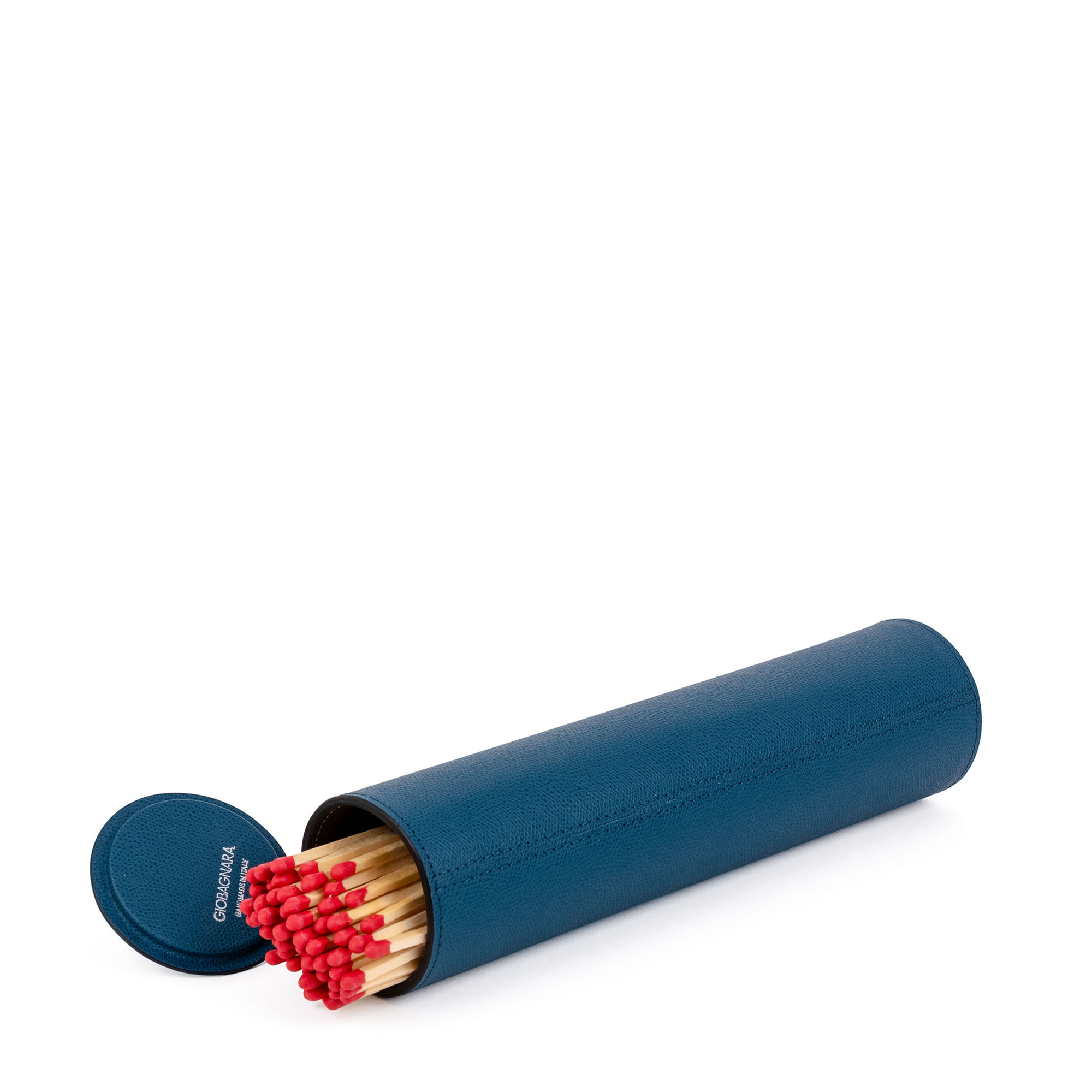 This luxurious set of giant matches in a premium petrol blue calfskin-wrapped holder is the chicest way to light your fires. It includes 60 matches and has a strike pad at the base of the holder.