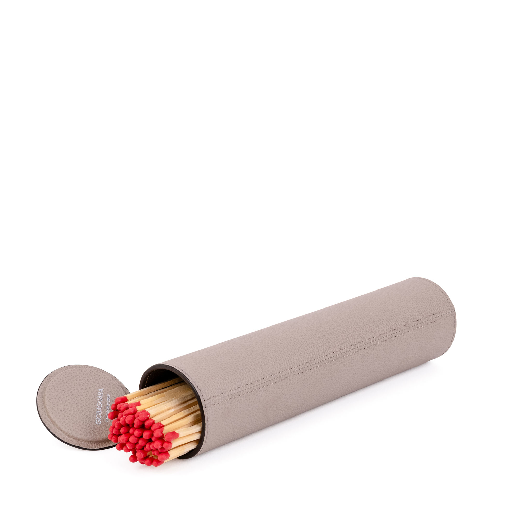 This luxurious set of giant matches in a premium beige calfskin-wrapped holder is the chicest way to light your fires. It includes 60 matches and has a strike pad at the base of the holder.