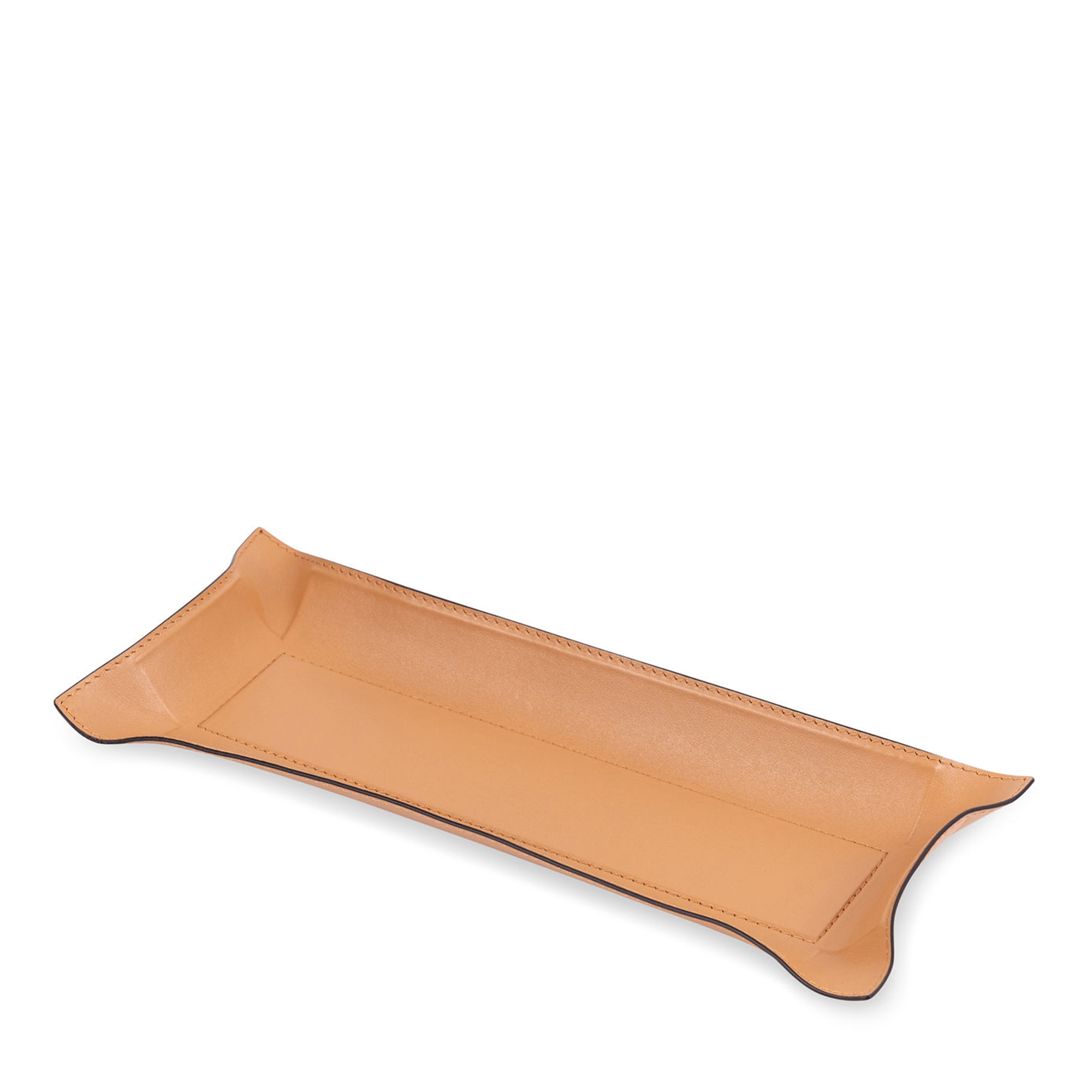 This rectangular caramel tray with black borders has the hard base and flexible sides that can be adapted to your preferred arrangement. Covered in the finest calfskin, it makes a both functional and decorative piece for any space at home.