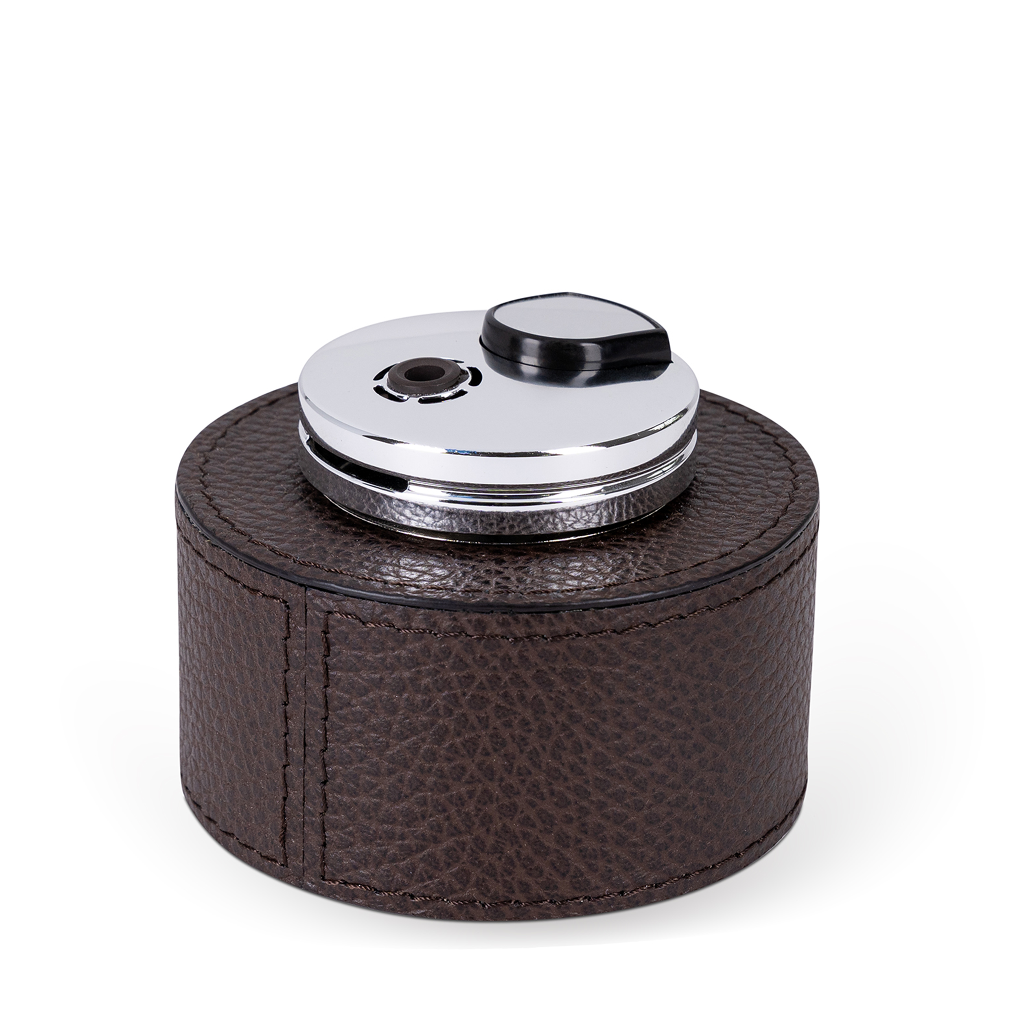 This table lighter features a handcrafted rounded wood base, luxuriously covered in dark brown embossed leather, making it a classic detail with an expressive texture.