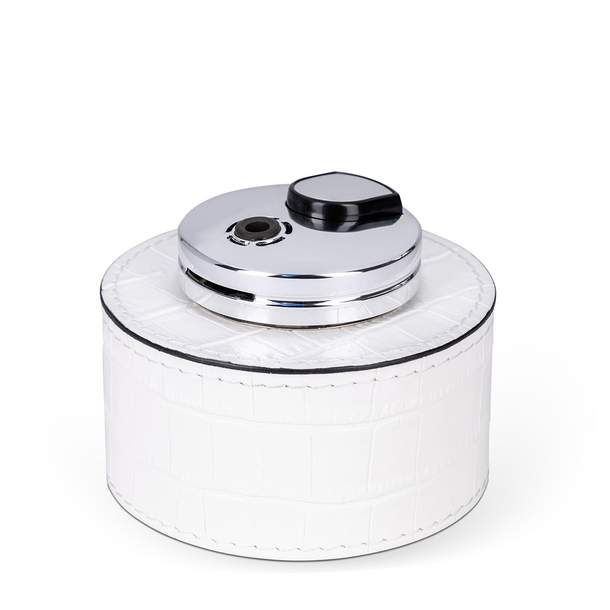 This table lighter features a handcrafted rounded wood base, luxuriously covered in white embossed leather, making it a classic detail with an expressive texture.