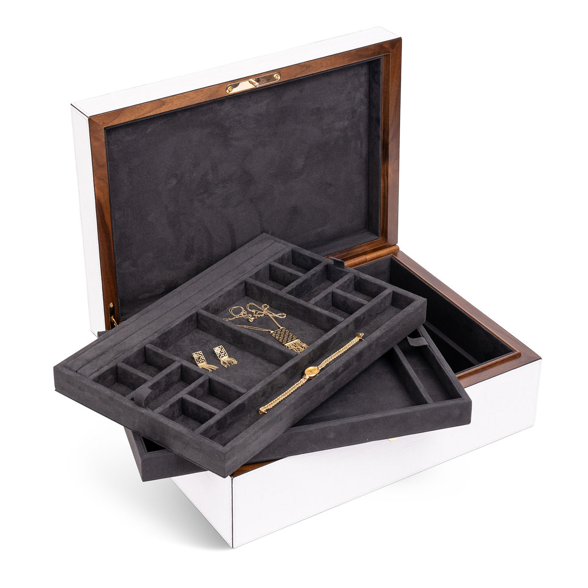 This elegant jewelry box is perfect for storing and displaying your jewelry and heirlooms. The handmade walnut case is covered in white crocodile embossed leather, with a charcoal suede interior. It includes two removable trays with compartments of different sizes to keep your pieces organized and secure.