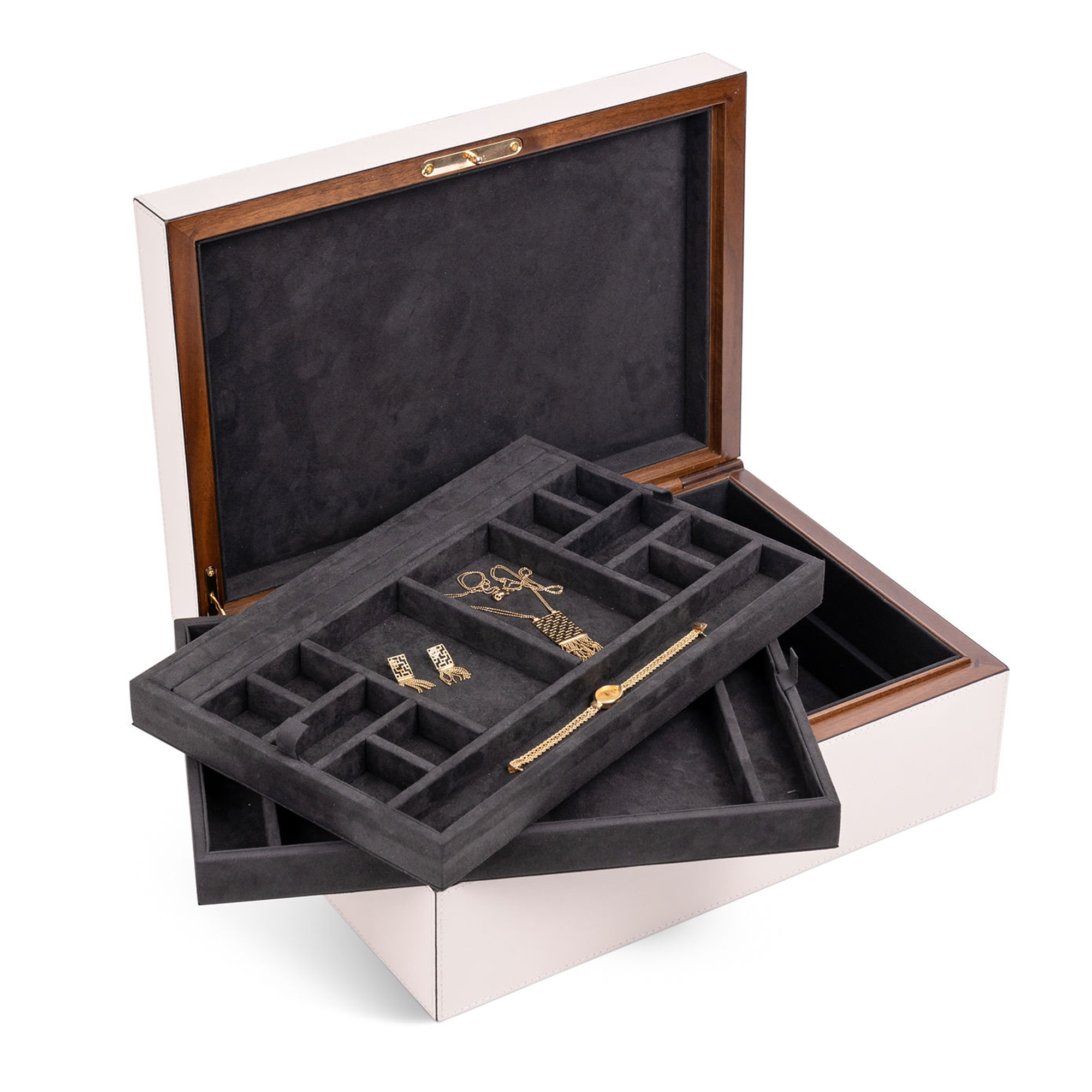 This elegant jewelry box is perfect for storing and displaying your jewelry and heirlooms. The handmade walnut case is covered in off-white nappa leather, with a charcoal suede interior. It includes two removable trays with compartments of different sizes to keep your pieces organized and secure.