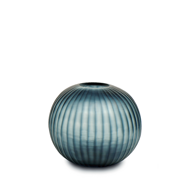 This remarkable round, ball-like vase is crafted from pleated dark green glass. Its textured surface adds depth and a sleek finish to the rich indigo hue, making it a unique and eye-catching addition to your home decor.