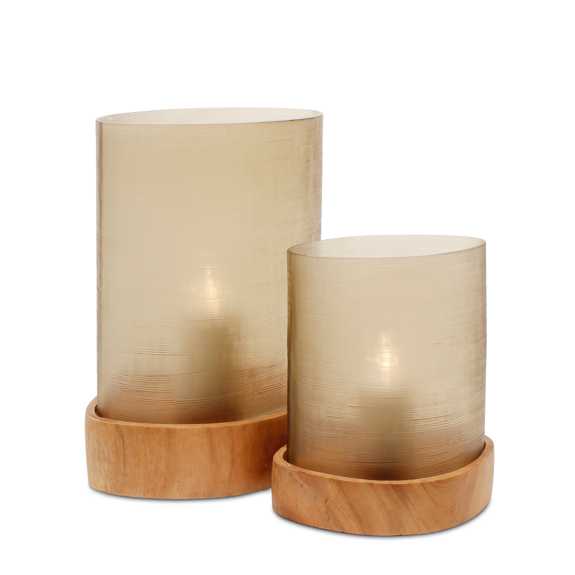 This elegant Inari Hurricane, made of glass and sycamore wood, captures attention with its simplicity and makes warmer any indoor and outdoor space with soft smoke hues.