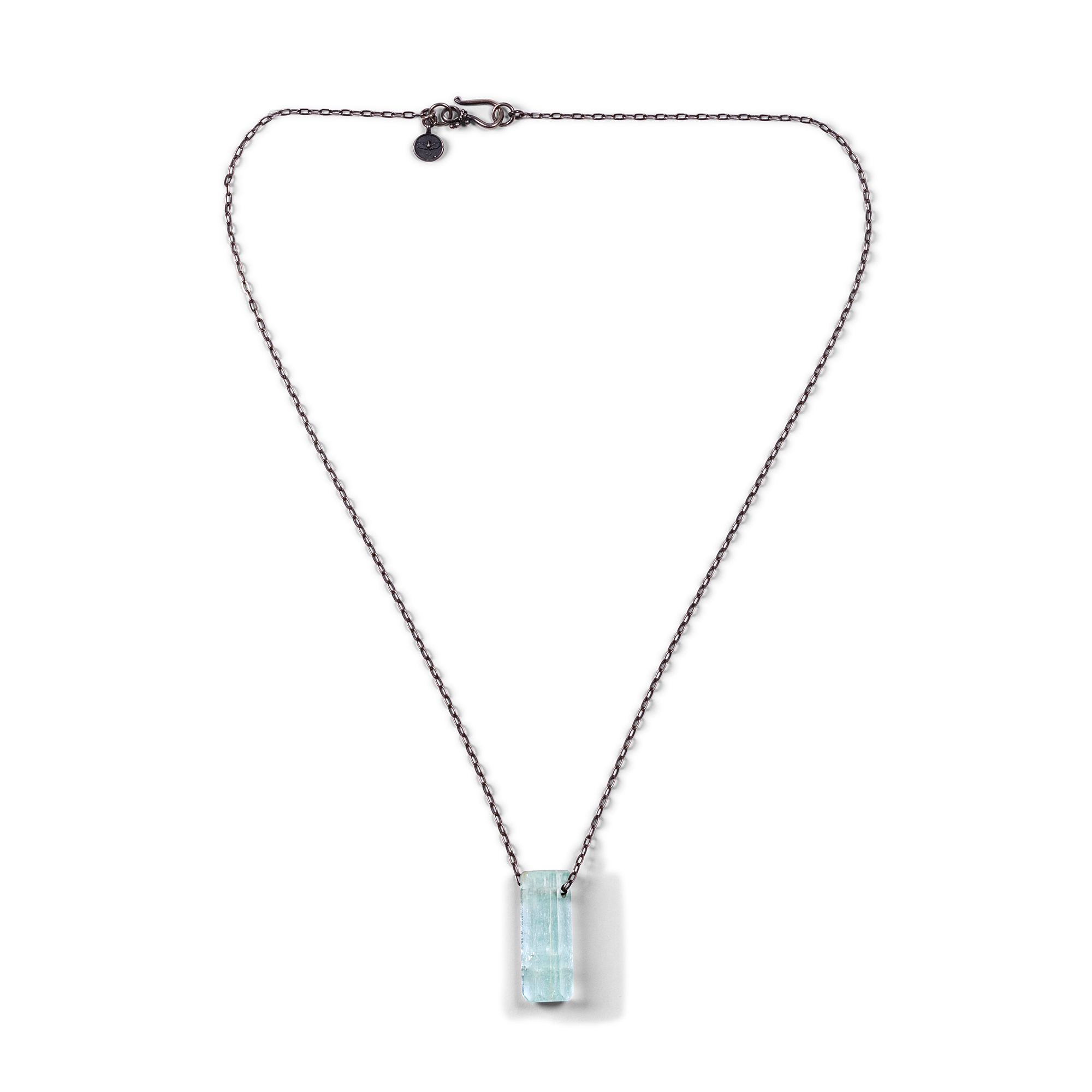 This aquamarine necklace on a silver chain clears the mind and balances emotions.