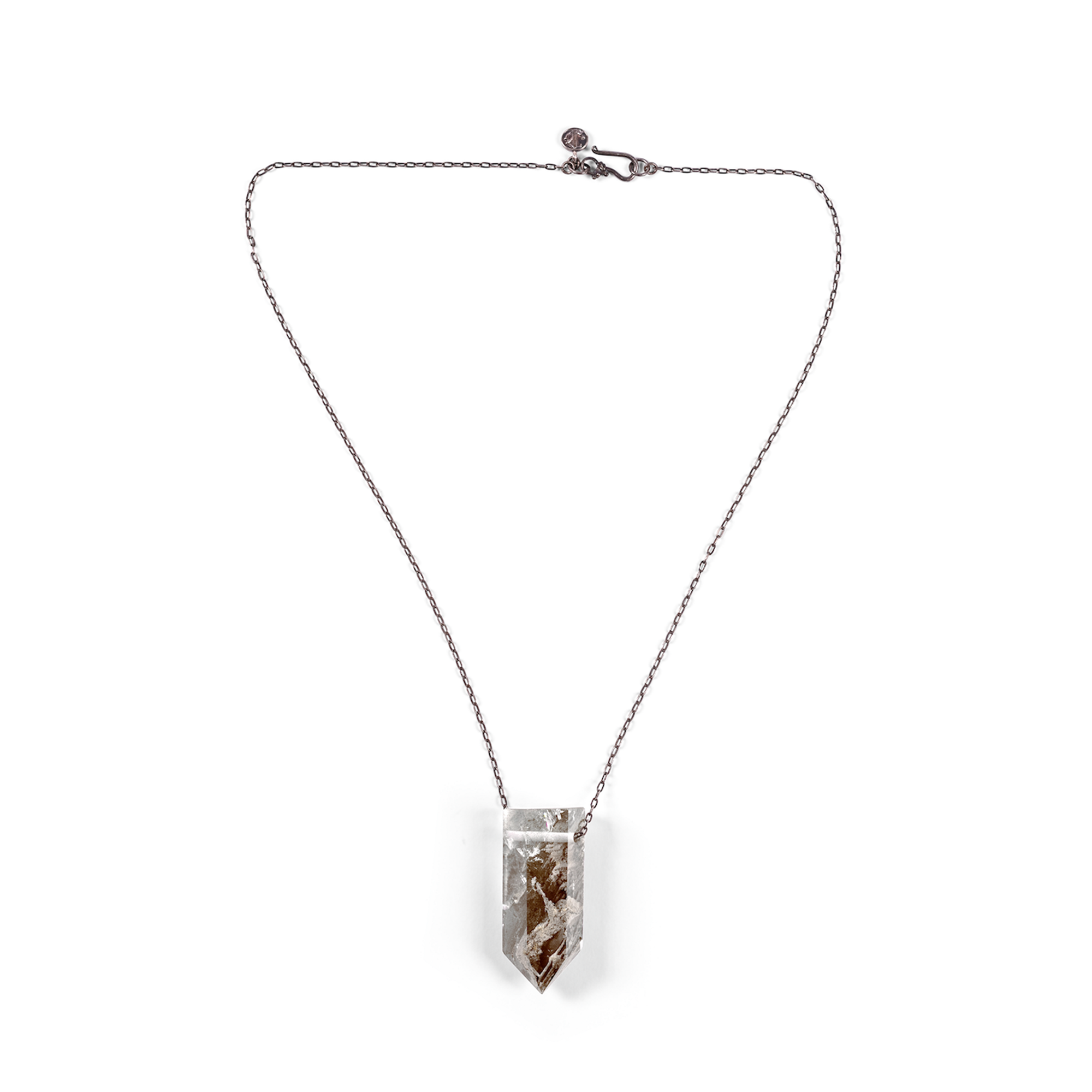 Clear Quartz with Chlorite Inclusion Necklace on a silver chain, medium size. Chlorite purifies both physical and spiritual self, and this energy is amplified by the Quartz Crystal. Enhances overall purification and clarity.