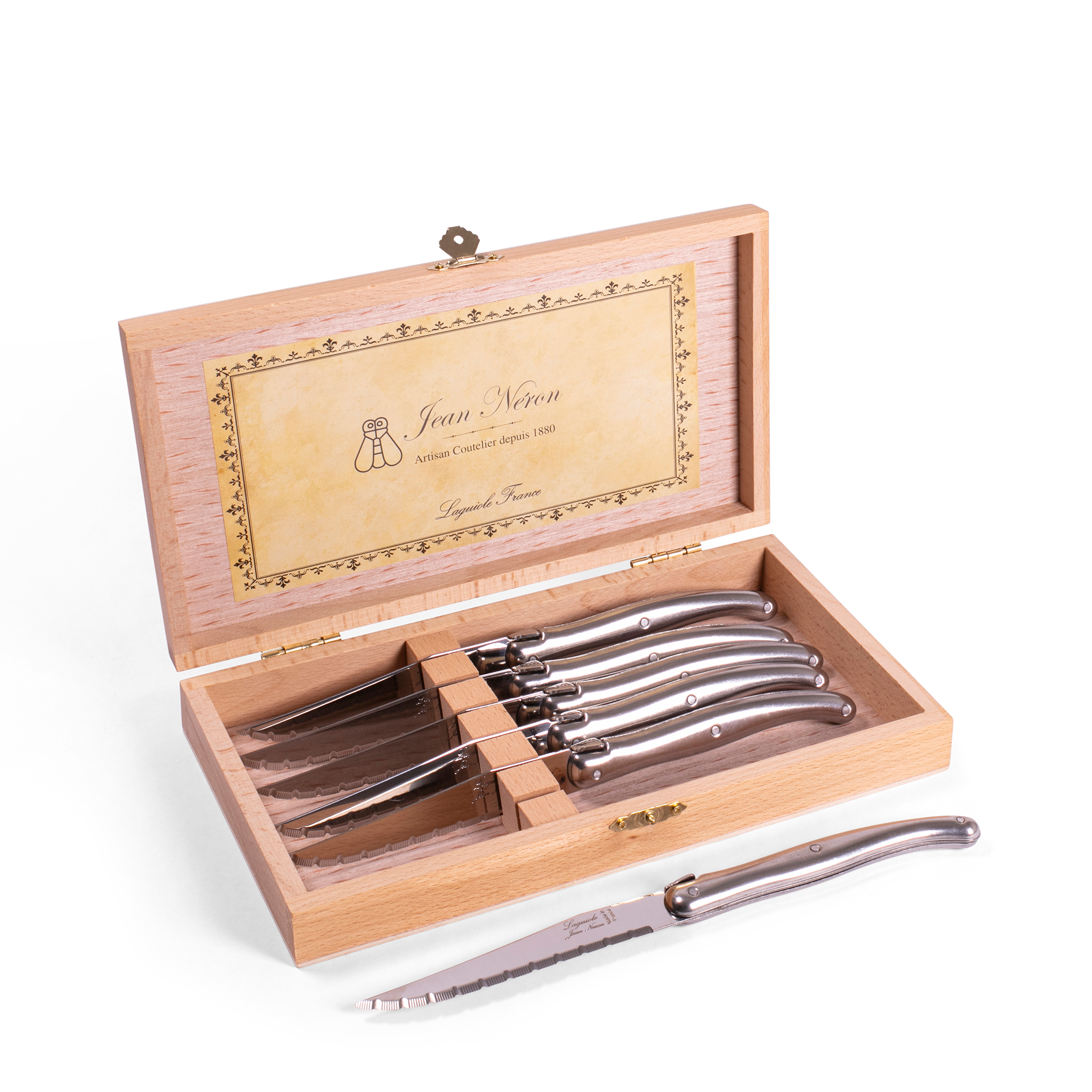 Steak Knives, hand-crafted in France by expert craftsmen, this six-piece steak knife set features mirror-finished blades and stainless steel handles embossed with the bee detail synonymous with Laguiole.