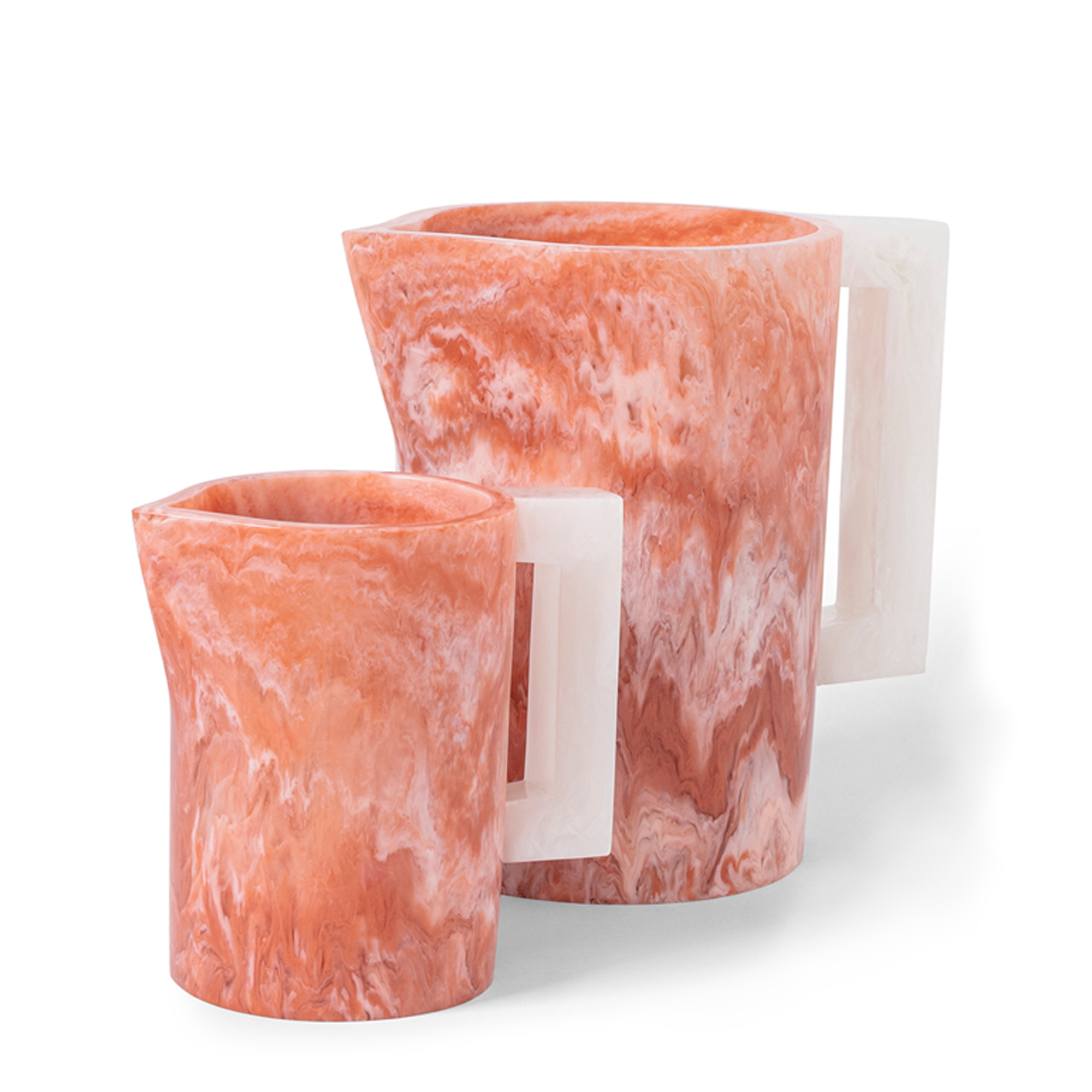 This Coral and White playful pitcher, with its delicately dispersed color that becomes more vibrant as light passes through, adds charm to your festive summer dinner party. Handcrafted using high-quality polymer resin from the Philippines.