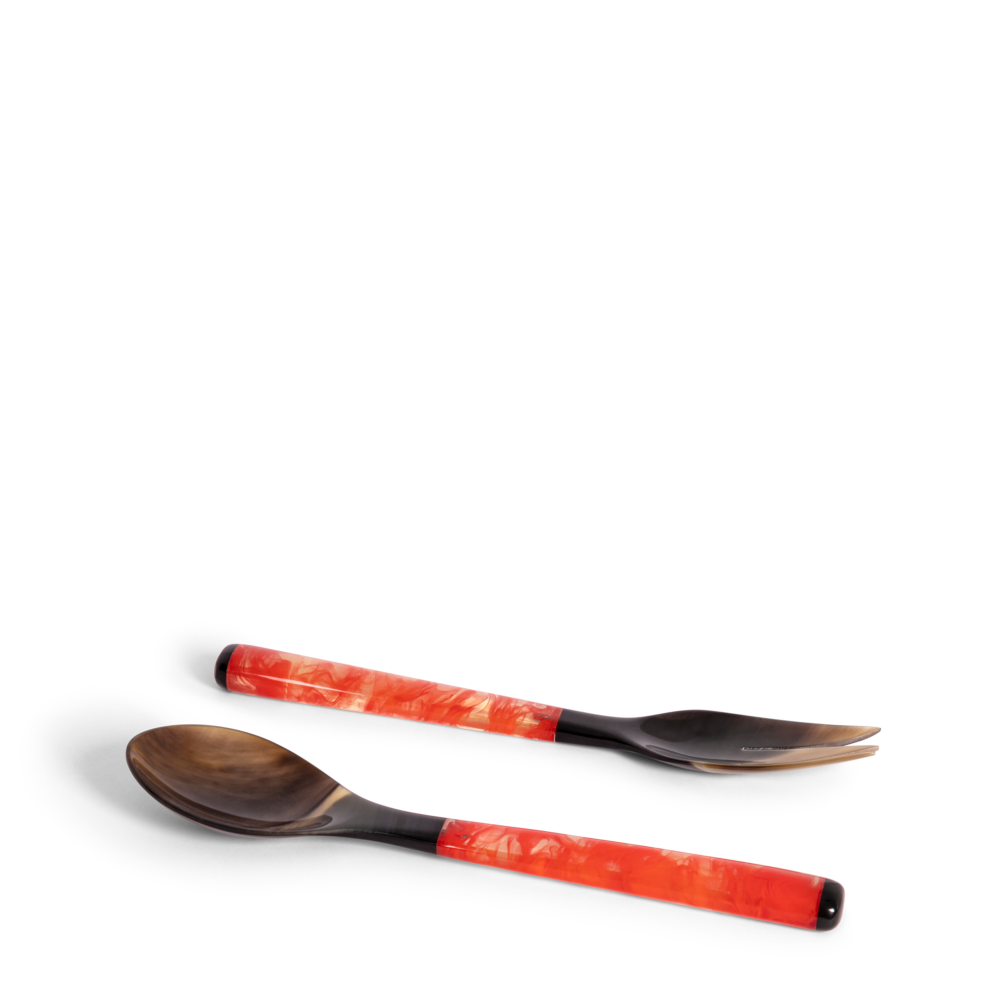 These orange popsicle servers are handcrafted from black and ivory horn and luminous resin, where orange and white colors are playing with each other. Perfect for serving salads and sides.