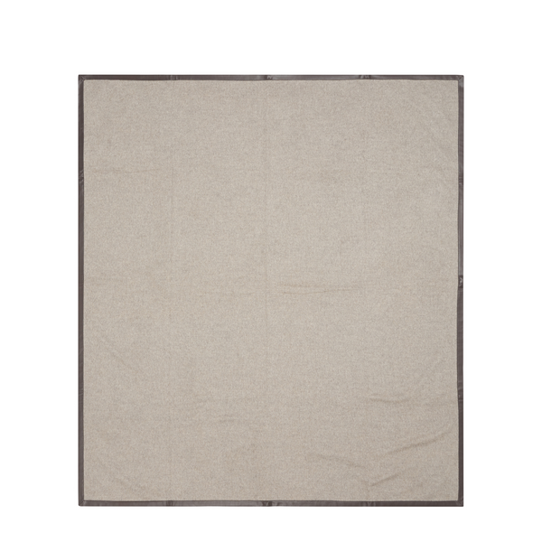 Sophisticated beige reversible throw with taupe leather edges for a luxurious look.
