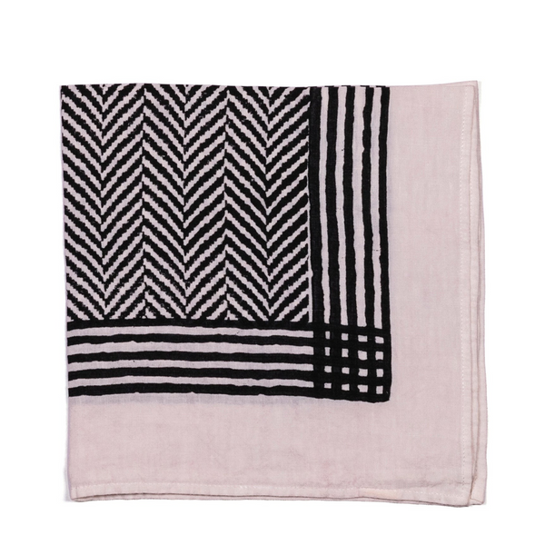 A stylish white base napkin with a black chevron pattern, adding a bold and modern touch to your table settings.