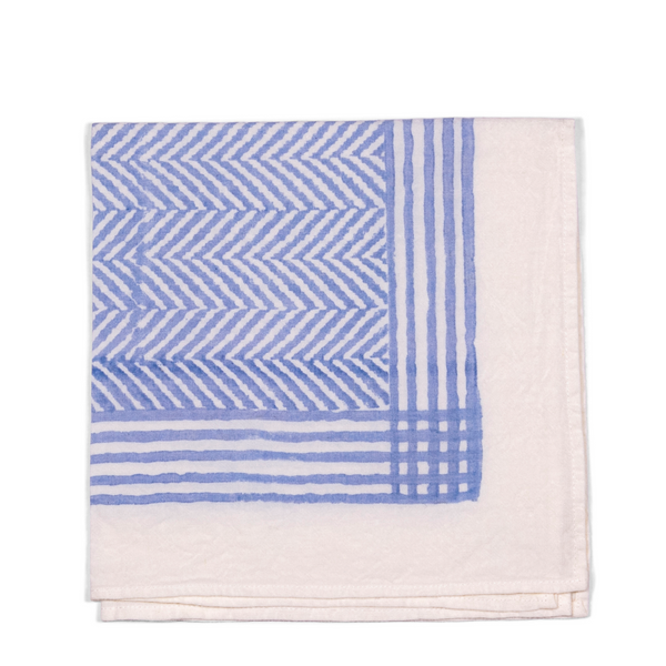 A chic and versatile addition to your table setting, this napkin blends modern design with understated sophistication. The white base and light blue tones and chevron pattern bring a touch of contemporary style to any event or dining experience.