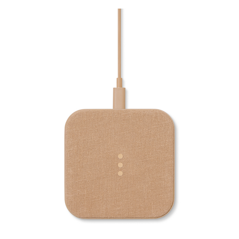 Sleek linin covered wireless charger combines functionality and elegance. This modern camel piece is a stylish addition to your office desk or any other space in your home.