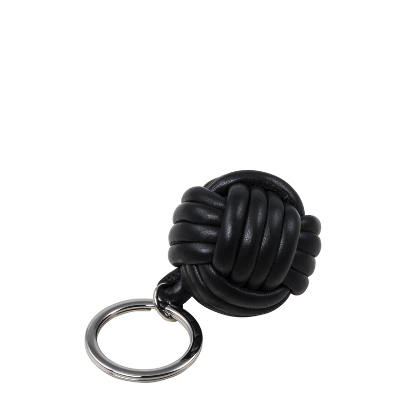 Handcrafted from exquisite black nappa leather by skilled artisans, it adds a classic elegance to your keyring.