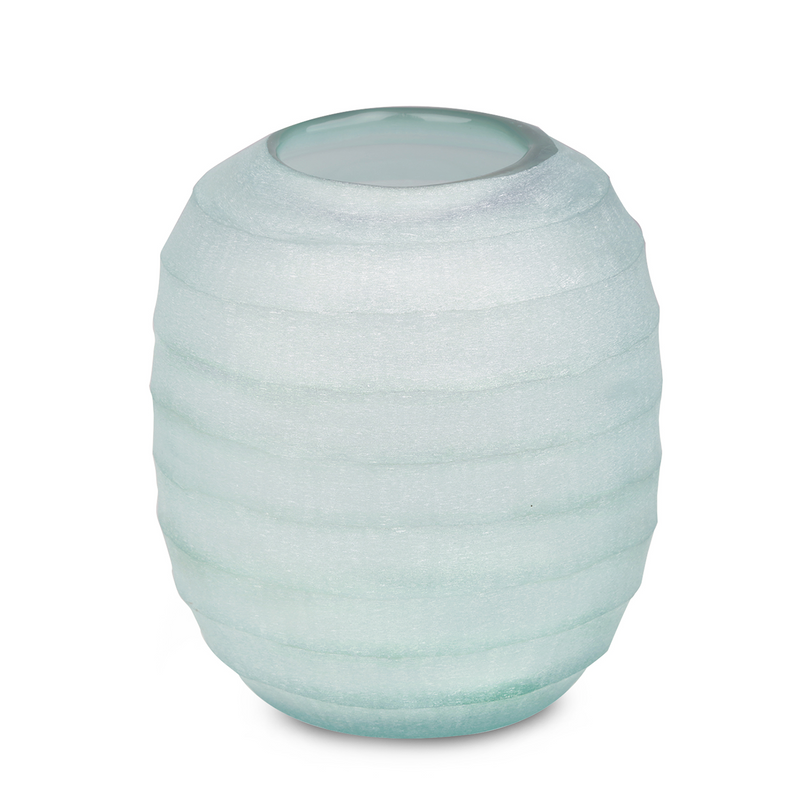 Reminiscent of a clear day's sky, this extra large handmade glass vase boasts a gentle light blue hue and a curved form that interacts with light across its textured surface, imbuing any space in your home with a touch of elegance.