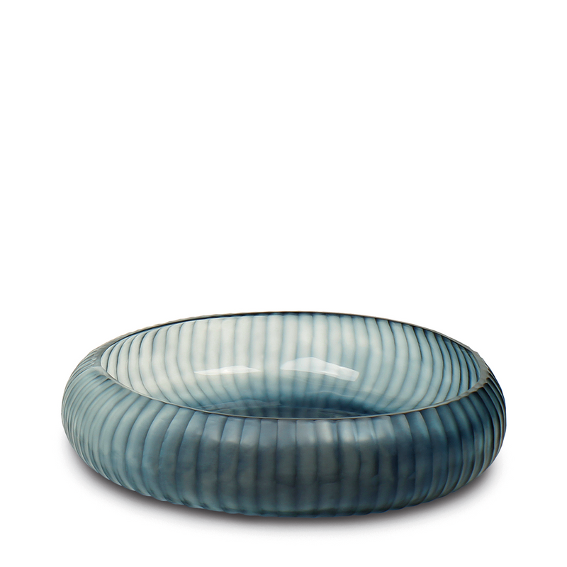 This striking bowl is crafted from pleated dark green glass. Its textured surface adds depth and a sleek finish to the rich indigo hue, making it a unique and eye-catching addition to your home decor.