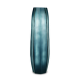 Koonam Vase Tall is is made of glass, and has a special, distinctive ridged motif. Its striking indigo hue and faceted, the most elongated form in this collection makes it a bold, luxurious addition to your home decor.