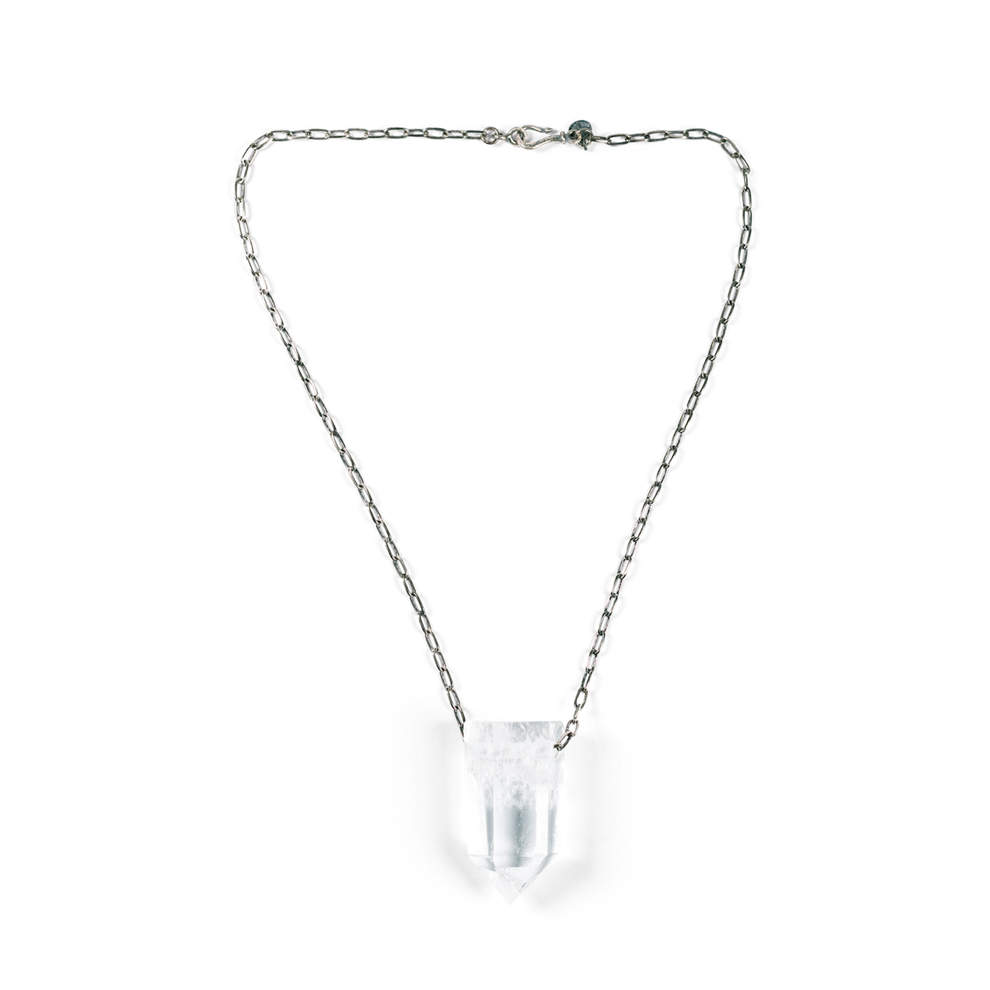 Clear Quartz Necklace on a silver chain with a large clear quartz crystal. This powerful stone enhances mental clarity, clears one's energy field, and amplifies intentions and the effects of other stones. It brings clarity to thoughts and a sense of purpose.