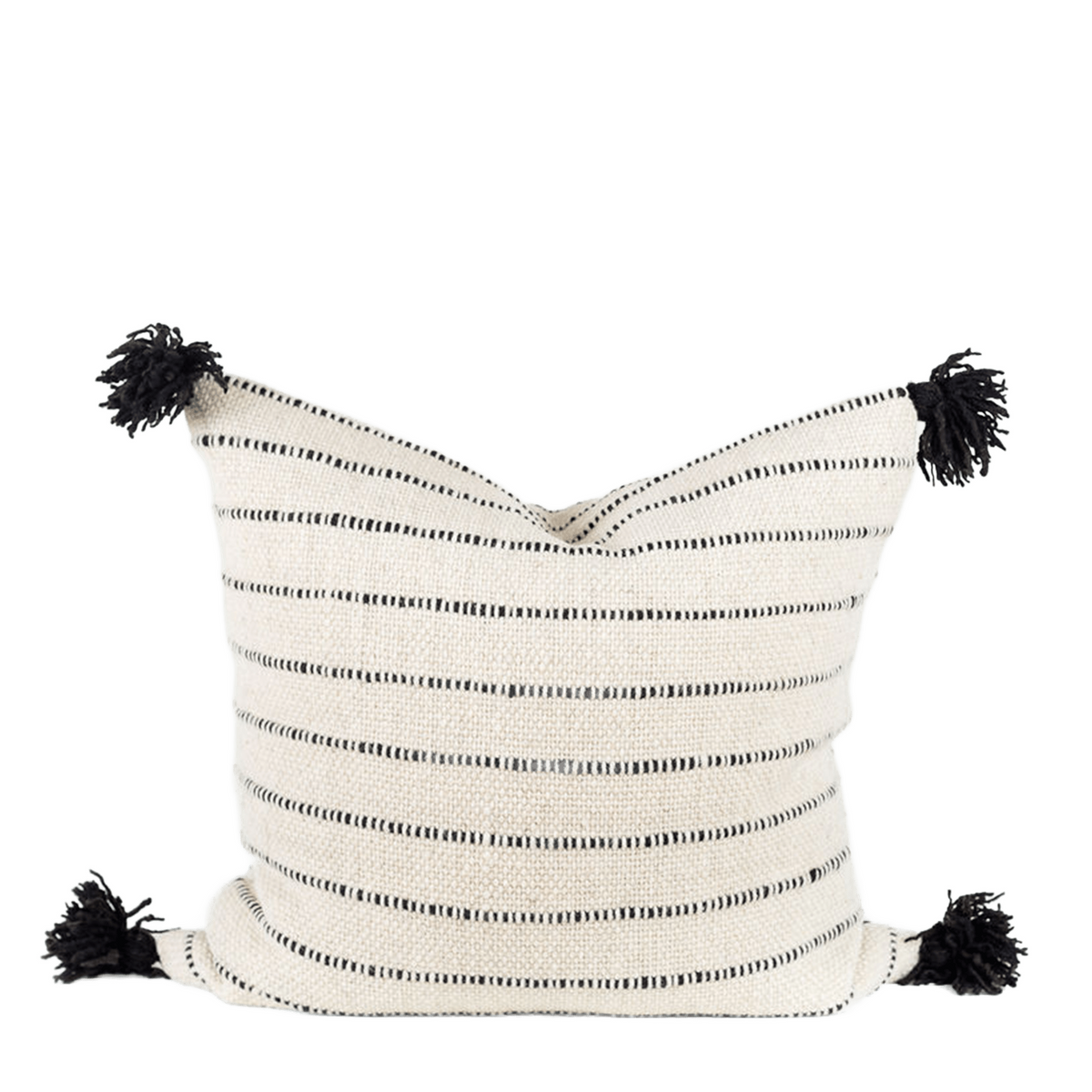 White pillow with black pom poms hotsell