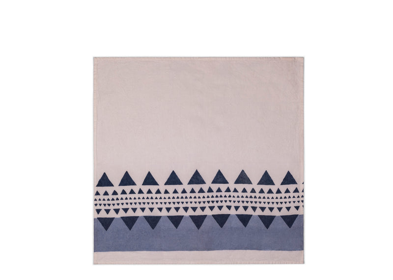 Unfolded napkin featuring an elegant white backdrop enriched with captivating dark blue and slate hues.