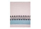 Unfolded tea towel featuring a white base adorned with modern light blue and black geometric elements.