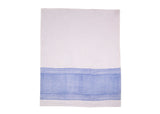 Unfolded tea towel revealing white base and light blue chevron pattern, brings a breath of fresh air to your kitchen.