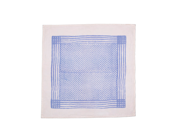 Unfolded light blue chevron patterned napkin with white base brings a refreshment to your table, and makes a perfect choice for casual gatherings or serene dining settings for any season.