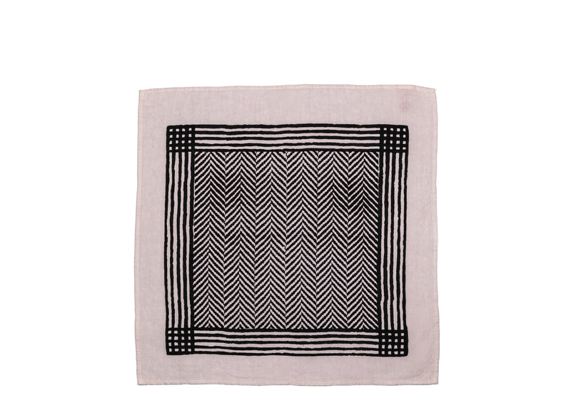 Unfolded white base napkin with a black chevron pattern that creates a visually striking effect, perfect for both formal occasions and casual gatherings.