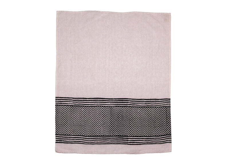 The bold black chevron design on white base adds a touch of contemporary flair to your culinary space while offering reliable absorbency for everyday use.