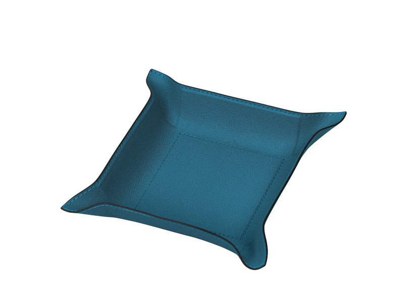 This exceptional petrol blue square tray has the hard base and flexible sides that can be adapted to your preferred arrangement, and covered in the finest calfskin makes a both functional and decorative piece for any space at home. 
